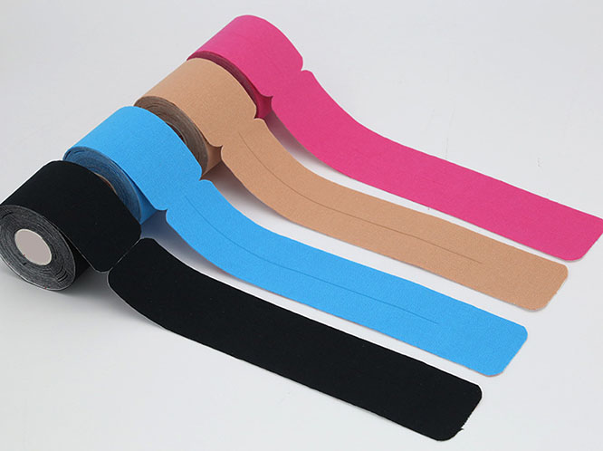 Kinesiology tape rolls and pre-cut strips in multiple colors for sports therapy and muscle support