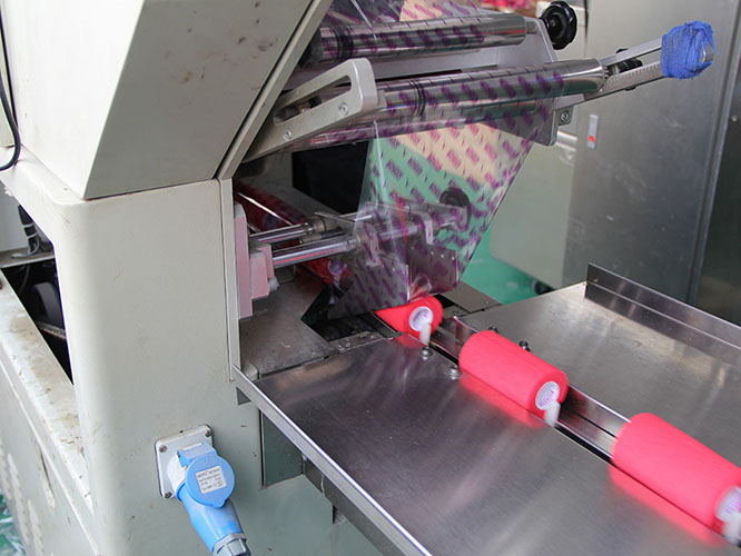 Automatic coating and printing machine for kinesiology sports tape production 