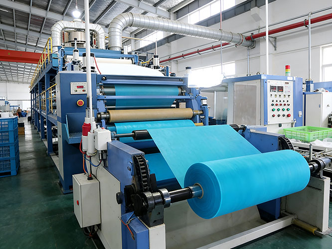 Slitting machine processing kinesiology tape jumbo rolls into sports tape products 