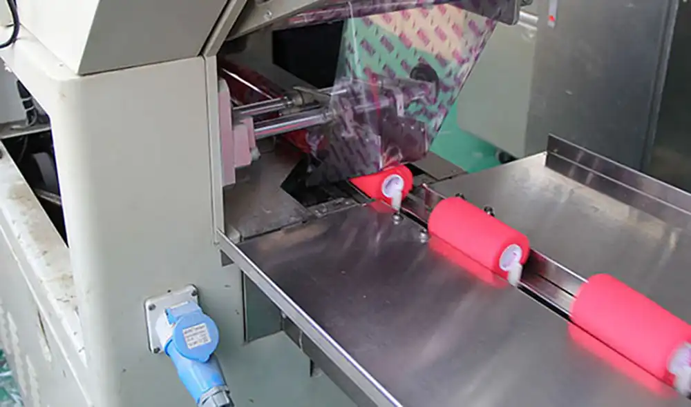 Automatic coating and printing machine for kinesiology sports tape production
