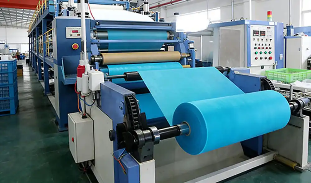 Slitting machine processing kinesiology tape jumbo rolls into sports tape products