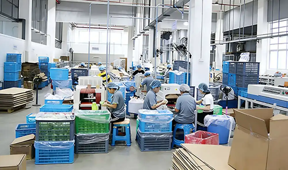 Warehouse worker handling sports tape raw materials in manufacturing factory